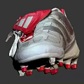 Silver Soccer Cleats With Red Laces Striped Upper And Studded Sole Design