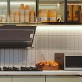 Bright Modern Kitchen With Large Window Countertop Range Hood And Food Storage Cabinets