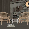 Two Woven Rattan Chairs With Small White Table In Living Room And Patterned Wallpaper Floor Lamp