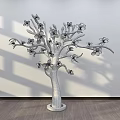 Elegant Window Display Featuring Decorative Tree With Yellow Flowers And Shadow On White Wall 3d model