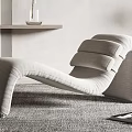 Modern Interior With Comfortable Chaise Lounge Gray Carpet Floor Lamp And Side Table