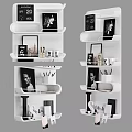 Stylish White Wall Mounted Shelving Unit With Decorative Frames Mugs And Books