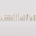 White Decorative Columns With Various Designs Arranged In A Row For 3d model