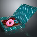 Open Blue Polka Dot Doughnut Box With Colorful Doughnuts Inside