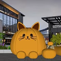 Giant Pumpkin Cat Sculpture At Modern Shopping Mall With Small Pumpkins And Greenery