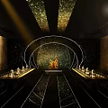 Golden Curved Structure With Illuminated Lines And Central Flame Like Sculpture On Circular Platform