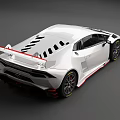 White Lamborghini Sports Car With Rear Wing Aggressive Front Fascia And Alloy Wheels