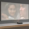 Wall mounted TV Displaying People on Gray Wall with Wooden Marble Shelf and Black Projector