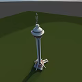 Modern Red And White Tower With Spire Top On Green Field And Blue Sky