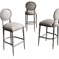 Modern Bar Stools With Gray Upholstered Seats Round Backrests And Metal Legs