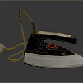 Classic Electric Iron With Black Handle Silver Base And Temperature Control Knob For Household Use