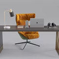 Modern Home Office Desk With Orange Chair Laptop Headphones And Table Lamp
