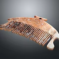 Vintage Wooden Comb With Intricate Carved Patterns And Elegant Curved Design