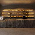 Modern Café Interior With Stone Counter Shelves And Warm Lighting