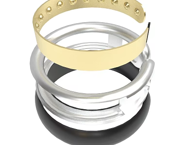 Gold And Silver Stacked Metal Rings With Perforated Design And Shiny Finish 3d model
