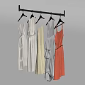 Colorful Dresses Hanging On Metal Rod With Different Styles And Hangers