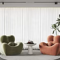 Green and Orange Velvet Accent Chairs With Small Round Table White Curtains And Potted Plant