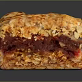 Homemade Square Oatmeal Dessert With Golden Crunchy Surface And Red Fruit Filling