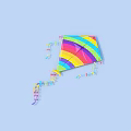 Colorful Rainbow Striped Kite With Long Tassel Tail On Light Blue Background