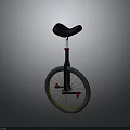 Stylish Unicycle with Black Seat Yellow Spokes and Red Pedals
