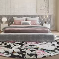 Elegant Modern Bedroom Interior With Upholstered Bed Round Floral Rug And Pink Armchair