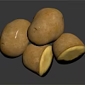 Golden Shiny Potatoes Whole and Sliced on Black Reflective Surface