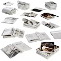 Open Books And Magazines With Variety Of Pages Featuring Photographs Text Stacked And Displayed