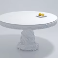 Round White Coffee Table With Small Plate Two Yellow Fruits And Carved Base