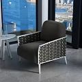 Single Sofa With Gray Cushion Silver Frame Small Side Table And Large Window City View 3d model