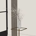 Transparent Glass Vase With White Blossom Branches On Glass Table Near Window