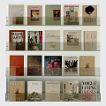 Books and Magazines Display On Glass Shelves With Various Art Design and Lifestyle Covers