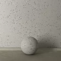 Decorative Sphere Component On Neutral Surface With Textured Wall Background