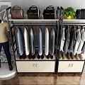 Retail Display Shelves With Hanging Shirts Shoes Bags Mannequin And Potted Plant