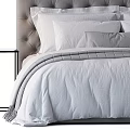 Elegant Double Bed With Upholstered Headboard White Pillows And Grey Throw Blanket 3d model