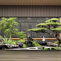 Zen Garden Interior Design With Pine Tree Bamboo Rocks And Small Statue