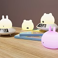 Cute Cartoon Animal Shaped Table Lamps With Digital Clock Display On Wooden Table