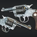 Vintage Revolvers With Classic Metal Components And Wooden Grips Close Up View