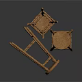 Natural Wooden Stools With Round Seats And Slender Legs In Standing And Fallen Positions