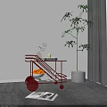 Red Modern Side Table With Wheels Holding Oranges Books And Green Plant