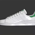 Classic White Sneakers with Green Accents and Comfortable Lace Up Design