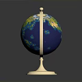 Detailed Decorative Globe With Golden Stand Base And Colorful Land Ocean Surface
