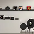 Headphones Round Speakers And Audio Equipment With Vinyl Records On Black Shelf White Cabinet