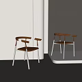 Modern Dining Chairs With Wooden Backrests And Sleek Metal Legs