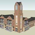 Red Brick Multi Story Building With Tower Courtyard And Arched Entrance Windows