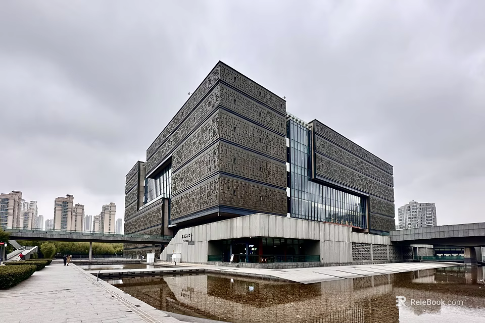 Modern Museum Building With Glass Curtain Wall And Water Reflection In Urban Area 3d model 