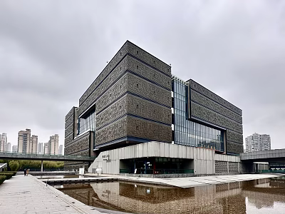 Modern Museum Building With Glass Curtain Wall And Water Reflection In Urban Area 3d model