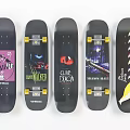 Diverse Skateboard Decks With Colorful Stripes Feather Art And Brand Graphics