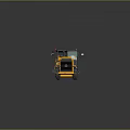 Yellow Construction Vehicle With Large Tires Black Top And Orange Warning Lights