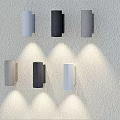 White Black Grey Wall Lamps Mounted on Light Colored Wall with Soft Illumination