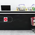Retail Reception Desk With Computer Monitor Shopping Baskets Cart And Items